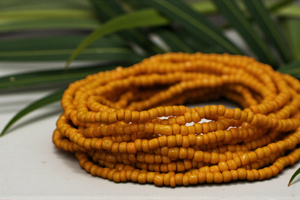 Waist Beads / Chaine de taille africaine - AIGBE - Jaune ocre (élastique)